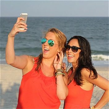 Two woman taking photo together